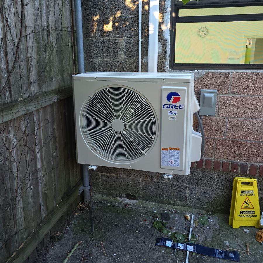 Heat pump outdoor condenser installed by Aura HVAC