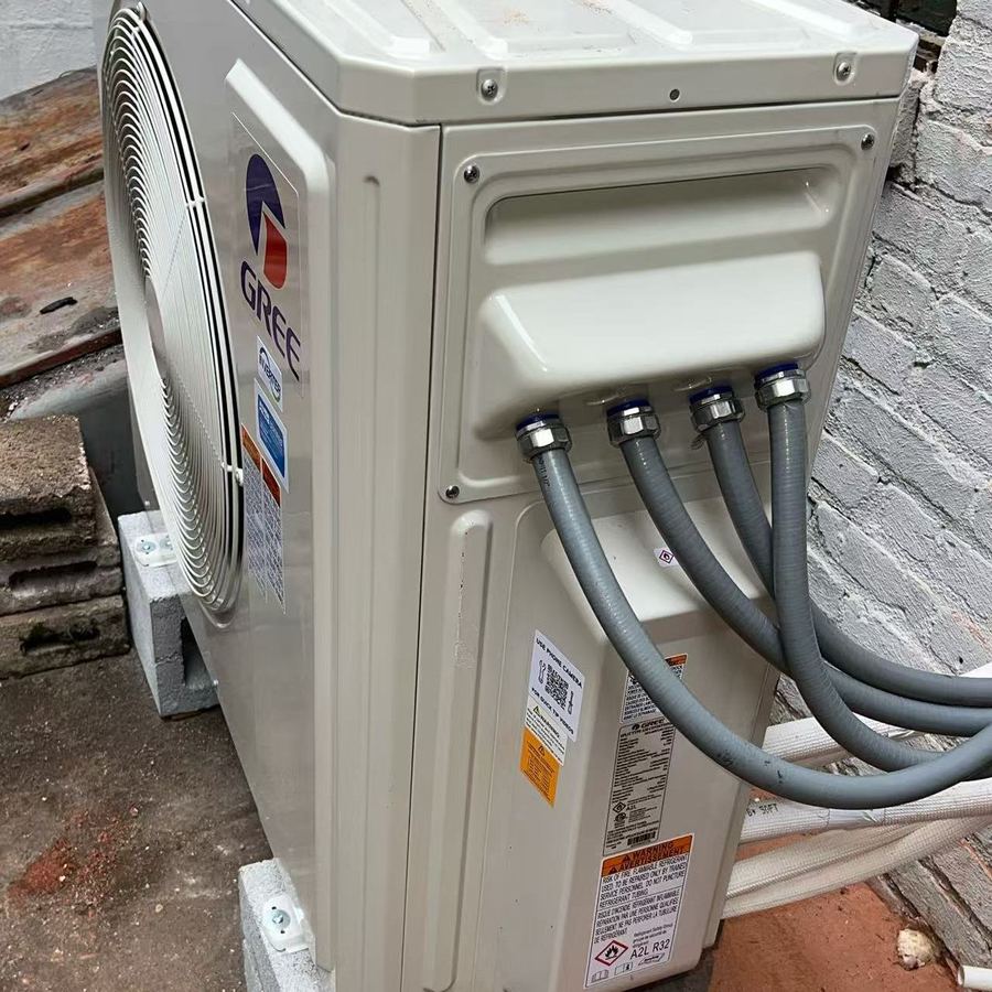 Heat pump outdoor condenser installed by Aura HVAC
