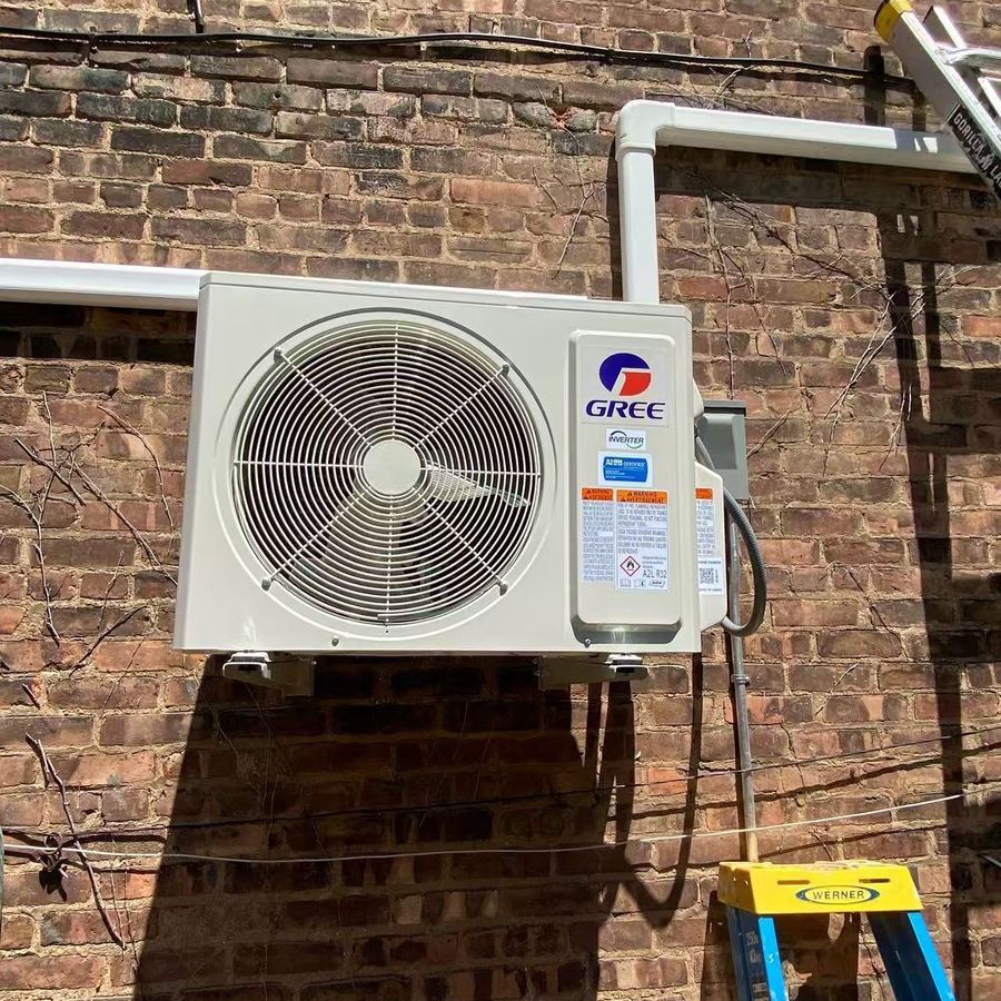 Heat pump outdoor condenser installed by Aura HVAC