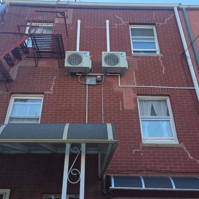 Heat pump outdoor condenser installed by Aura HVAC