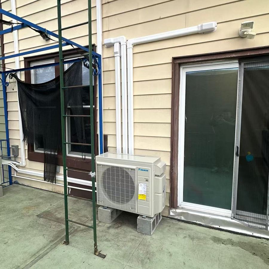 Heat pump outdoor condenser installed by Aura HVAC