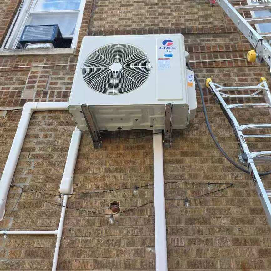 Heat pump outdoor condenser installed by Aura HVAC